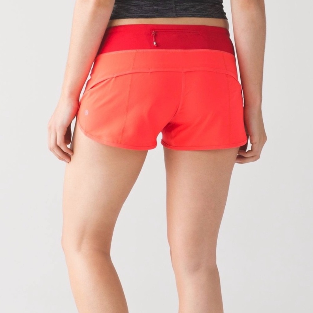 Lululemon Shorts • Size 4 • Two toned, red and orange/pink with back zipper